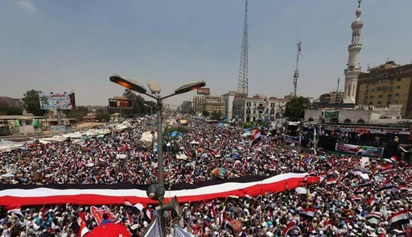 انصار مرسي يتظاهرون وبرلين تطلب الافراج عنه