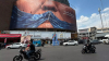 billboard with graphic showing Strait of Hormuz